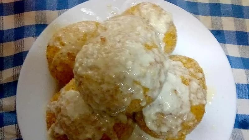 Arancini di riso alla zucca con fonduta di taleggio