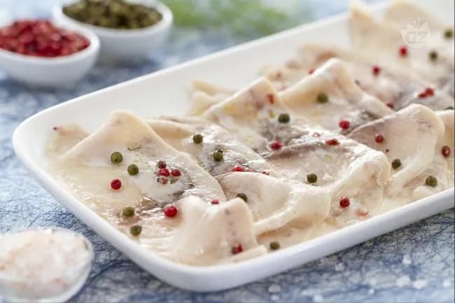 Carpaccio di pesce spada al pepe verde e rosa