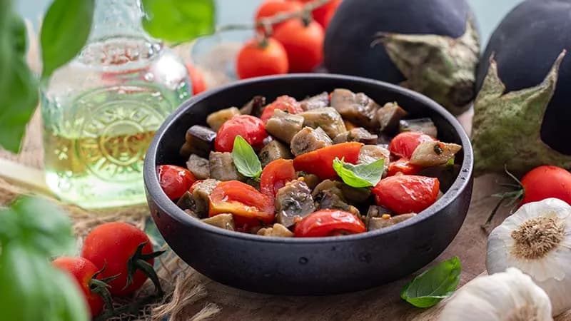 Melanzane e pomodorini al vapore