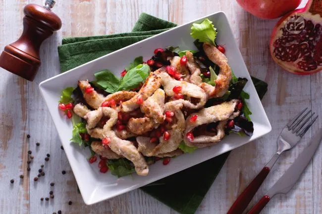Strisce di pollo alla melagrana